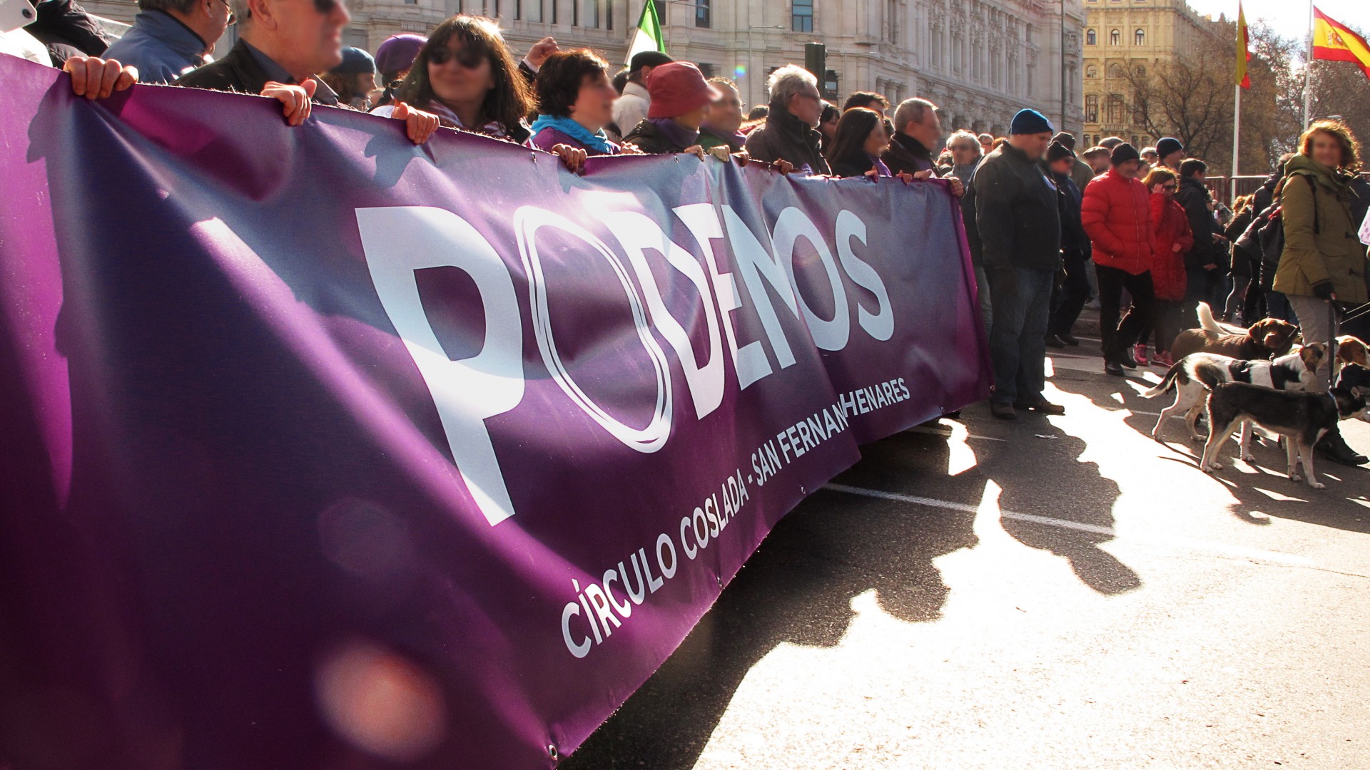 https://roarmag.org/wp-content/uploads/2015/12/Podemos_-_Coslada-1920x1080.jpg